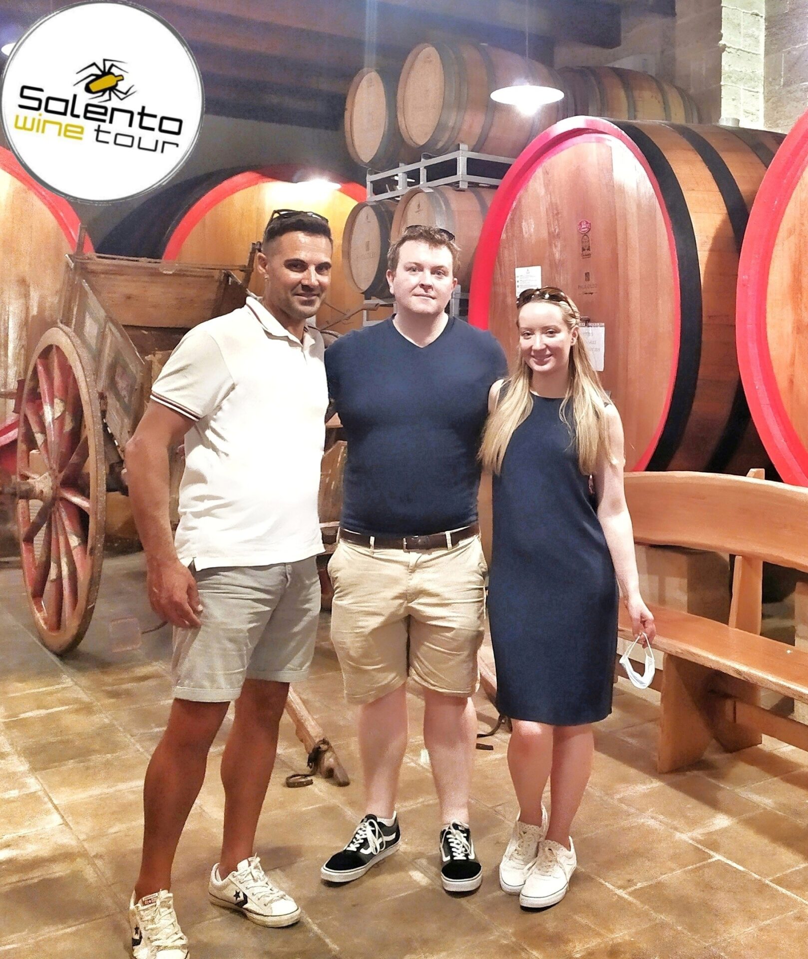 Salento Wine Tour guide with group at Paolo Leo Winery