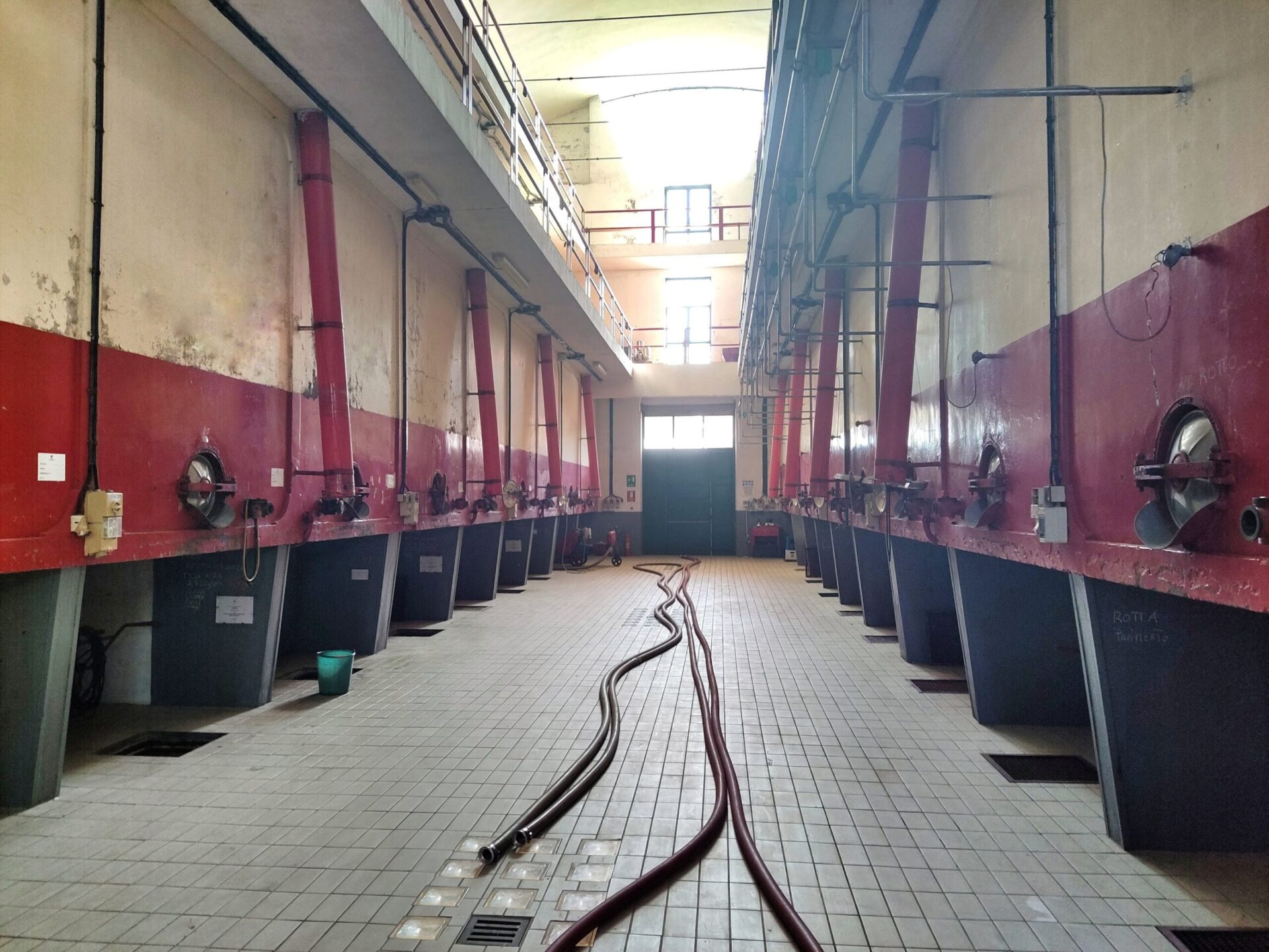 Traditional concrete wine fermentation vats at Cupertinum winery in Copertino, Italy