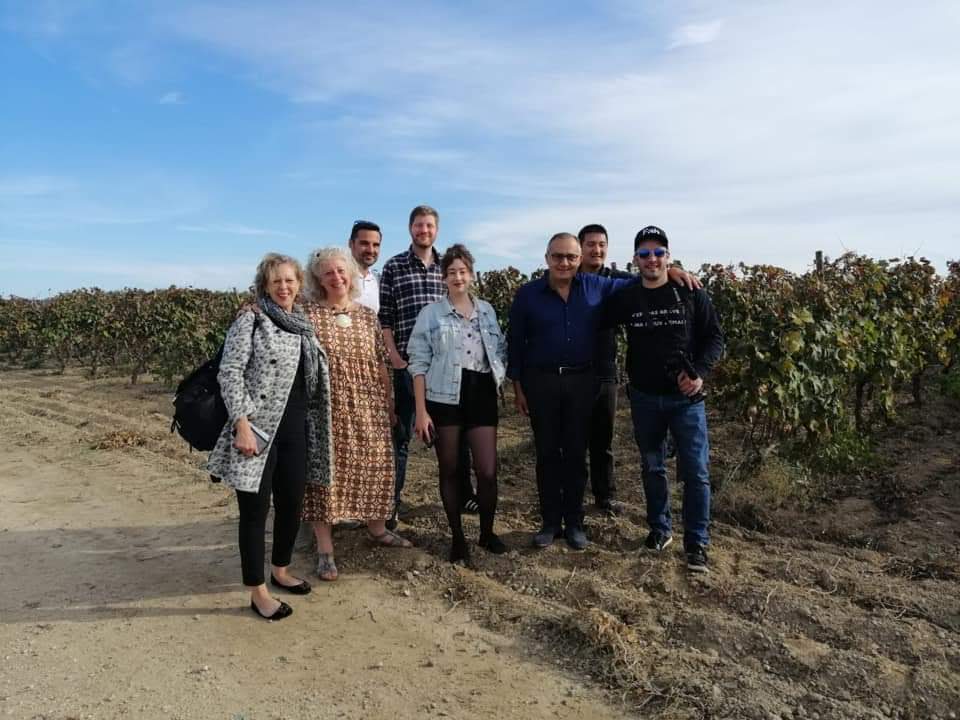 Group of wine experts and journalists at a winery in Guagnano during Negroamaro Stories press tour
