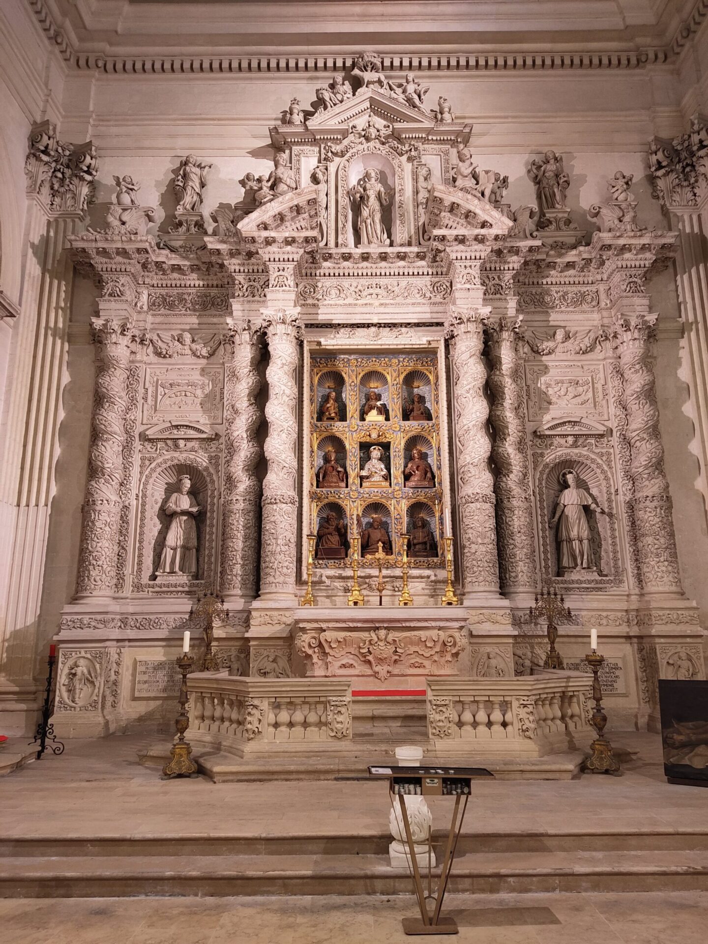 Baroque side altars with solomonic columns inside Lecce Cathedral