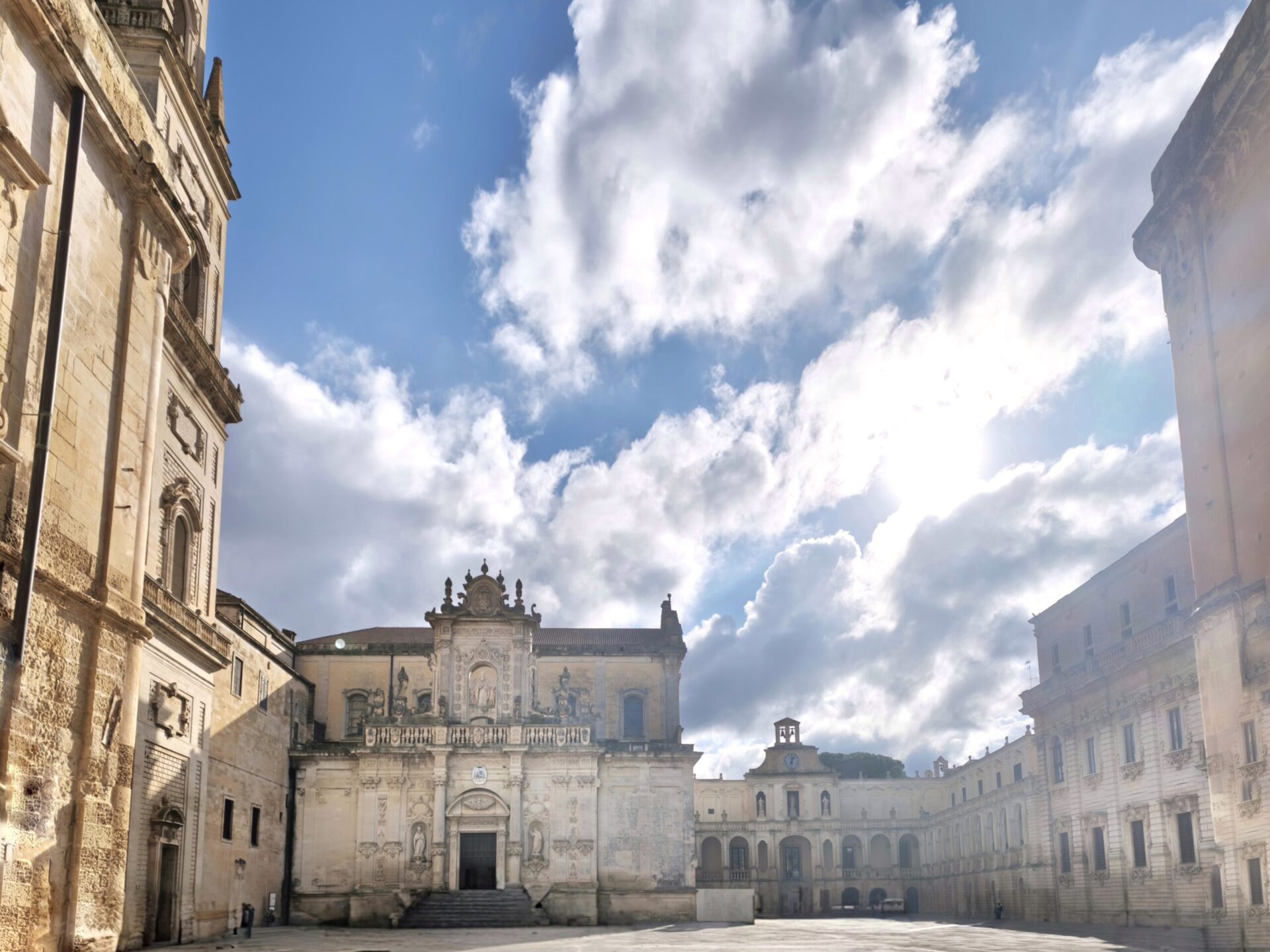 Piazza Duomo in Lecce with Baroque cathedral, campanile, bishop's palace and seminary in golden stone