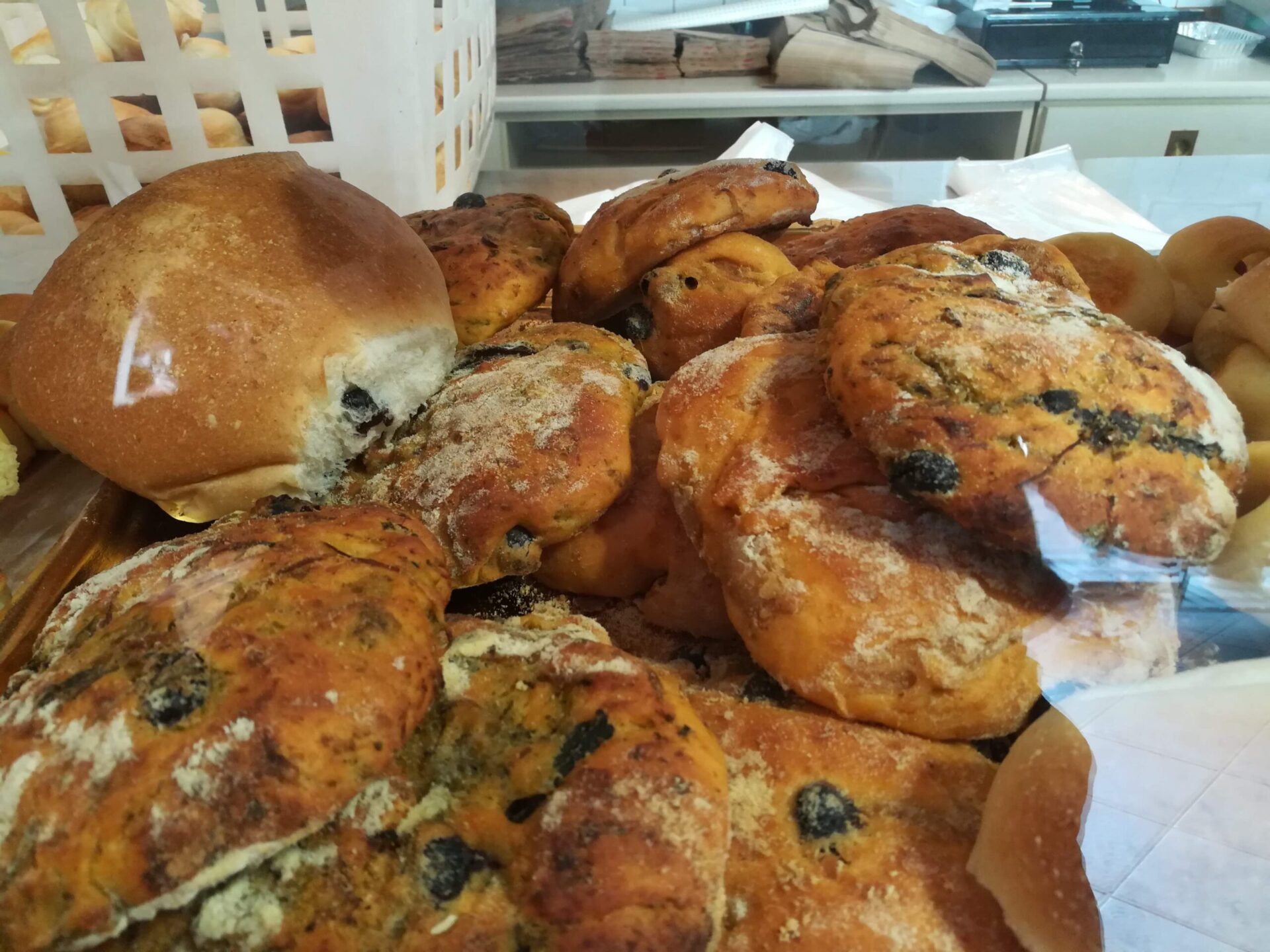 Traditional Pizzi and Pucce bread baking during a Salento cooking experience